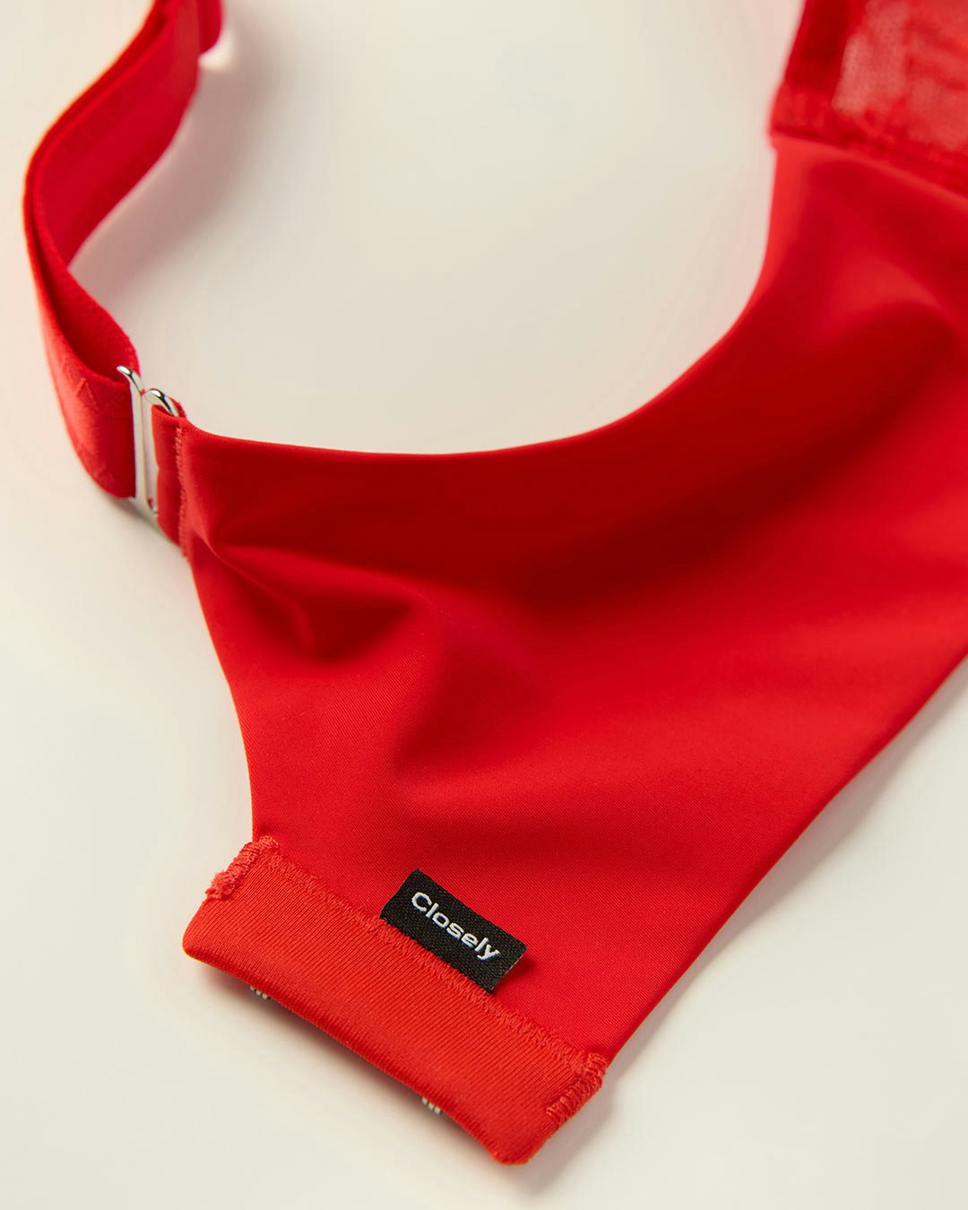 Details on a red t-shirt bra